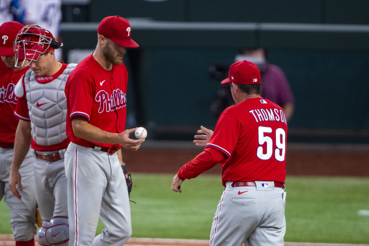 Rob Thomson relieves Zack Wheeler from his duties on Wednesday against the Texas Rangers.